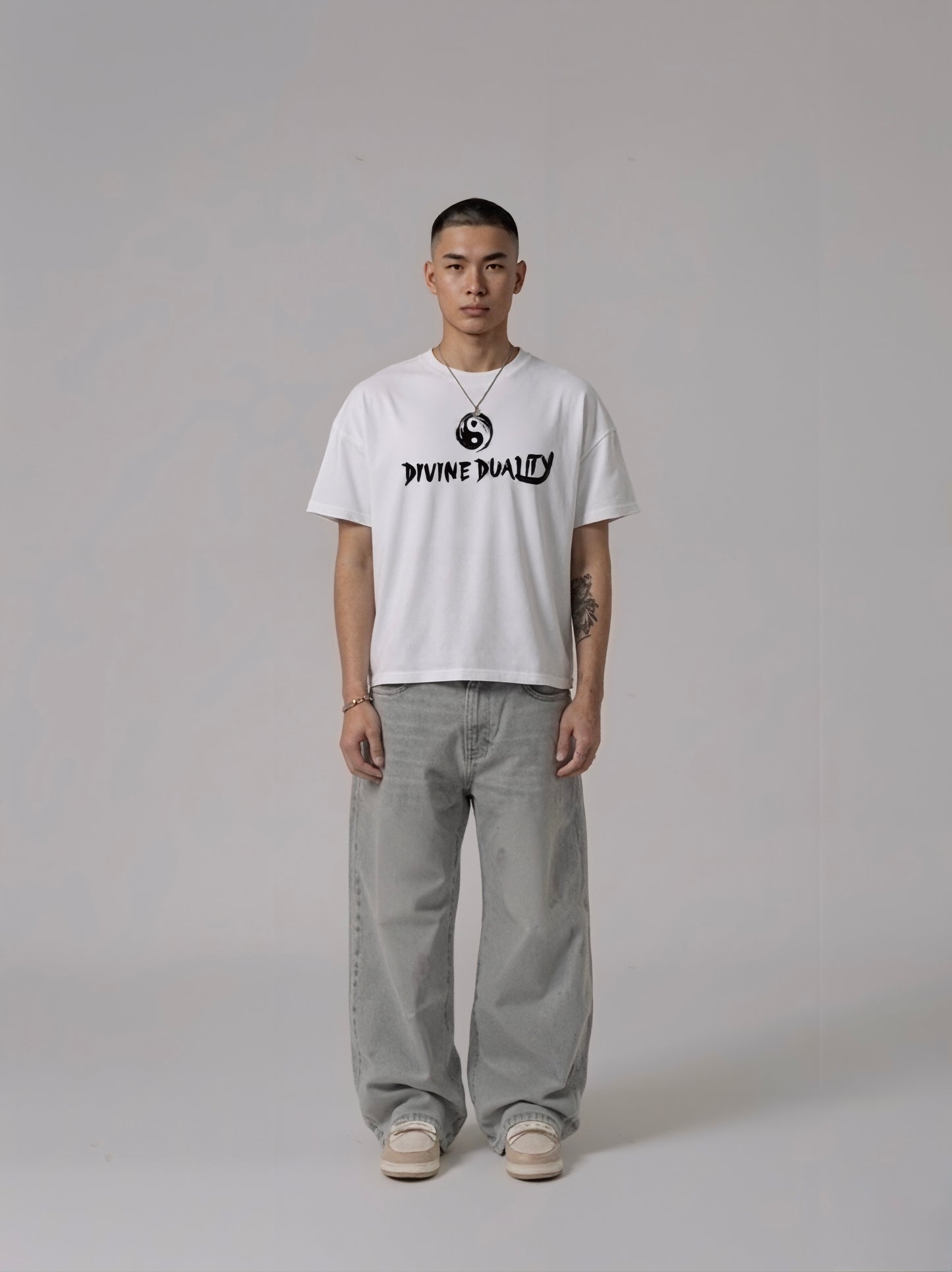 DIVINE DUALITY reversible T-shirt — Yang side worn on model