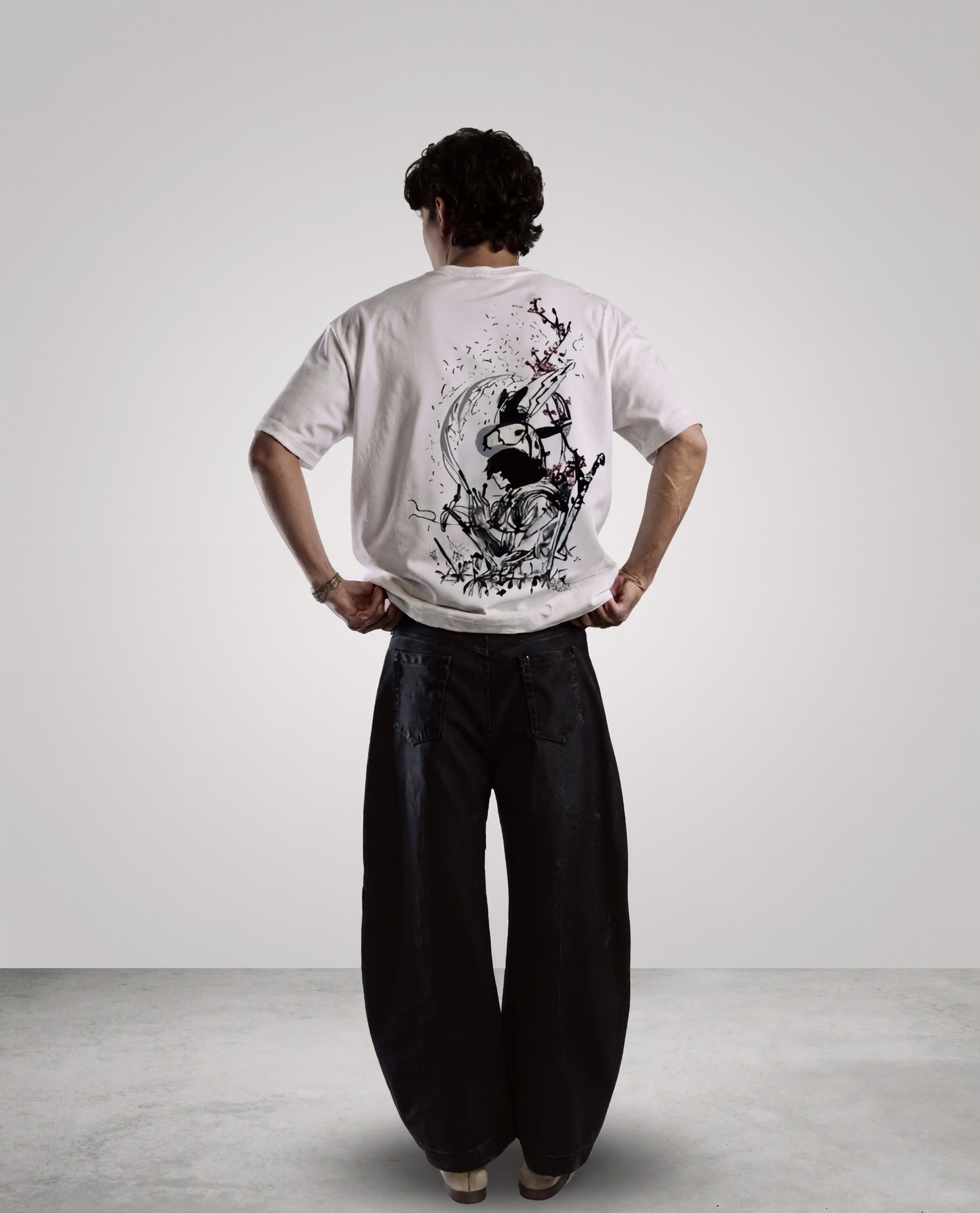 DIVINE DUALITY reversible oversized T-shirt — front view, Yin side (black)