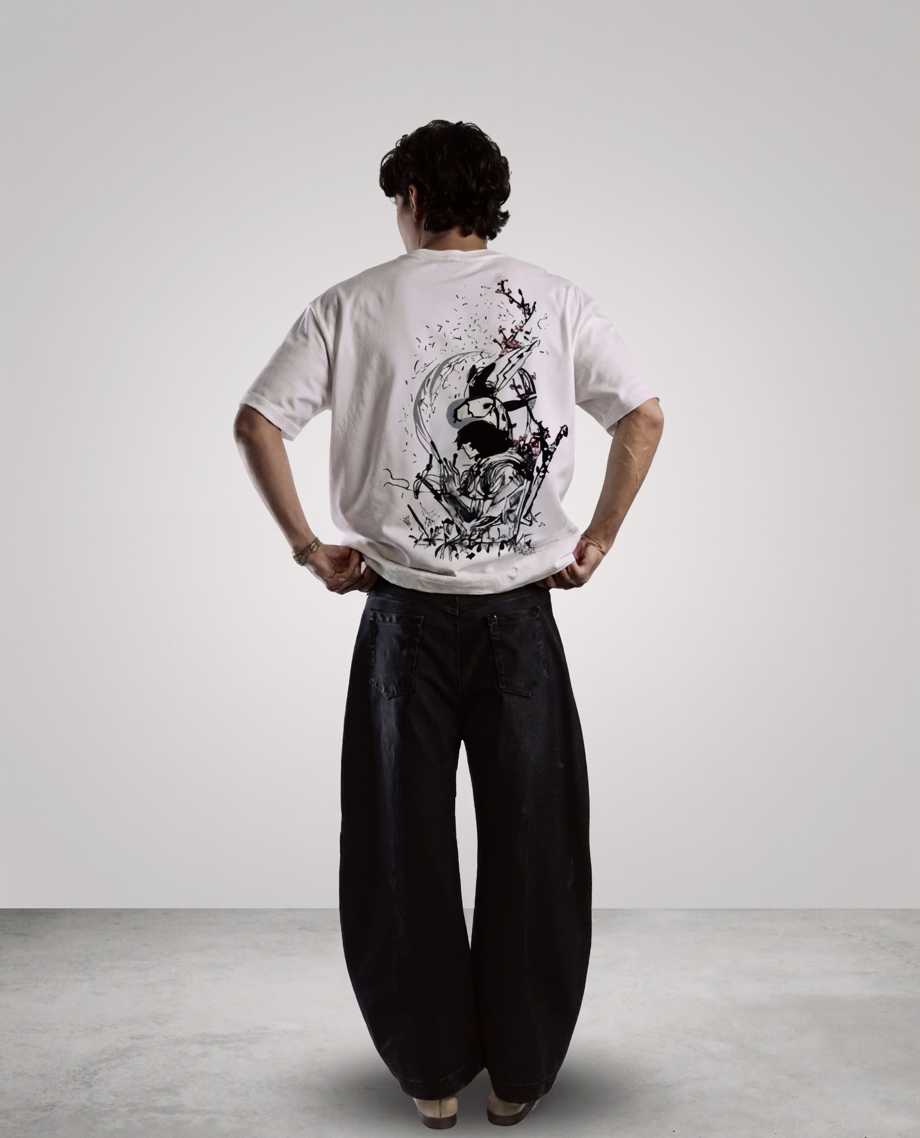 DIVINE DUALITY reversible oversized T-shirt — front view, Yin side (black)